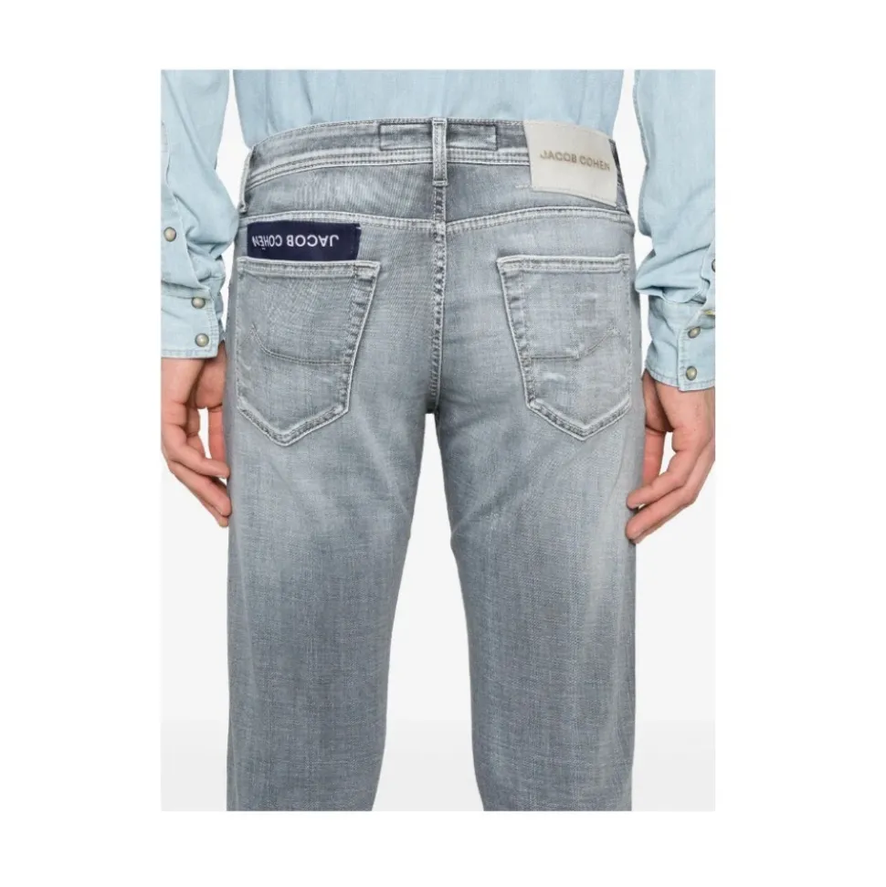 Slim Grey Nick Jeans met Rips
